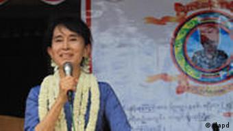 Aung San Suu Kyi speaks to local people during an opening ceremony of the Aungsan Jar-mon Library on in August.