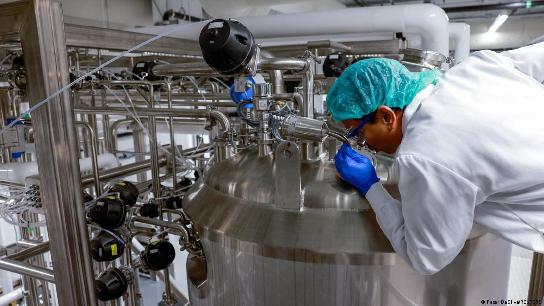 Founder & CEO Uma Valeti peers into one of the cultivation tanks at the Upside Foods plant, where lab-grown meat is cultivated, in Emeryville, California, U.S. January 11, 2023.