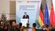 Chinas Premierminister Li steht an einem Rednerpult bei einer Veranstaltung Chinas Premierminister Li steht an einem Rednerpult bei einer Veranstaltung