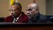 Task Force members, two men sitting at microphones Task Force members, two men sitting at microphones