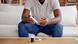 A seated man testing his blood-sugar levels. A seated man testing his blood-sugar levels.