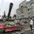 A Wagner mercenary sits atop in a tank in the Russian city of Rostov-on-Don