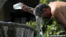 2023***
A man cools himself down with water from a water fountain during one of the hottest days of the third heat wave in Guadalajara, Jalisco state, Mexico, on June 12, 2023. (Photo by ULISES RUIZ / AFP)