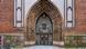 The highly decorated door to the St Nicolas Church in Stralsund The highly decorated door to the St Nicolas Church in Stralsund