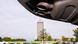Auspuff im Bildvordergrund vor Volkswagen Werk Wolfsburg im Hintergrund Auspuff im Bildvordergrund vor Volkswagen Werk Wolfsburg im Hintergrund