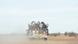 An image from 2016 showing people sitting in a pick up truck in a desert after leaving Agadez An image from 2016 showing people sitting in a pick up truck in a desert after leaving Agadez