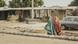 Three women wearing the Hijab walk on a street in Maiduguri, the capital of Borno state Three women wearing the Hijab walk on a street in Maiduguri, the capital of Borno state