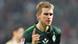 Mertesacker jumps over Italian player and German keeper Mertesacker jumps over Italian player and German keeper