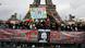 Demonstrators at the Eiffel Tower mourn the one-year anniversary of Cedric Chouviat's death in police custody