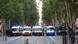 Police vehicles line the street of Marseille as they meet protestors Police vehicles line the street of Marseille as they meet protestors