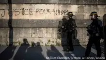 Writing on wall reads in French Justice for Nahel . Police patrol as youths gather on Concorde square during a protest in Paris, France, Friday, June 30, 2023. Photo by Eliot Blondet/ABACAPRESS.COM France's interior minister says there's been a downturn in unrest on a fourth night of rioting, with 471 arrests compared with 917 the previous night. But further violence has been reported in several French cities.The disturbances began on Tuesday after police shot dead a 17-year-old boy of Algerian descent, named as Nahel M. The officer who shot Nahel has apologised to the family, but the teenager's death has revived grievances about policing and racial profiling in France's suburbs. Photo by Eliot Blondet/ABACAPRESS.COM