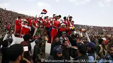 05/01/2022 SANAA, YEMEN - JANUARY 05: Yemenis celebrate with the national junior football team as they arrive in Sana'a, after winning the 2021 West Asia Youth Football Championship on January 05, 2022 in Sanaa, Yemen. After winning the 2021 West Asia Youth Football Championship, Yemen's national soccer team has been welcomed and celebrated throughout Yemen's war-torn governorates. In the midst of a context of war conflicts and divisions, Yemenis stand up with the same slogan With our soul and blood, we redeem you, Yemen. Mohammed Hamoud / Anadolu Agency