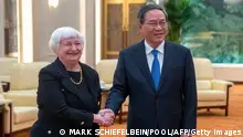 Chinese Premier Li Qiang (R) shakes hands with US Treasury Secretary Janet Yellen during a meeting at the Great Hall of the People in Beijing on July 7, 2023. (Photo by Mark Schiefelbein / POOL / AFP) (Photo by MARK SCHIEFELBEIN/POOL/AFP via Getty Images)