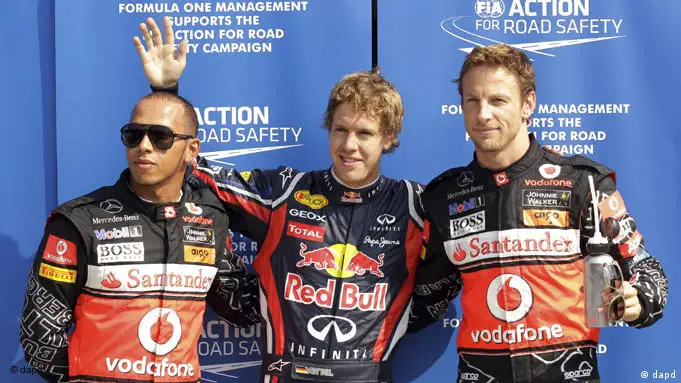 Lewis Hamilton, Sebastian Vettel und Jenson Button nach dem Qualifikationstraining von Monza (Foto: AP)