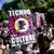 A person celebrates at the "Rave the Planet" techno parade with a poster reading -techno is my culture for UNESCO heritage-