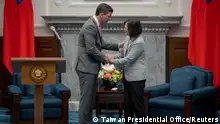 Paraguay's President-elect Santiago Pena and Taiwan President Tsai Ing-wen shake hands at a meeting at the presidential office in Taipei, Taiwan, in this handout image released July 12, 2023. Taiwan Presidential Office/Handout via REUTERS ATTENTION EDITORS - THIS IMAGE WAS PROVIDED BY A THIRD PARTY. NO RESALES. NO ARCHIVES.