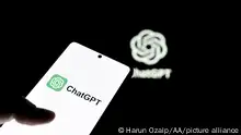 ANKARA, TURKIYE - JULY 11: In this photo illustration, ChatGPT is displayed on a mobile phone screen in front of a computer screen with the logo of 'ChatGPT' in Ankara, Turkiye on July 11, 2023. Harun Ozalp / Anadolu Agency