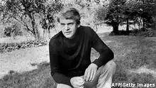 Czech writer Milan Kundera poses in a garden in Prague 14 October 1973. Novelist born in Brno, Czech Republic, Kundera lectured in Cinematographic studied in Prague until he lost his post after the Russian invasion in 1968. His first novel, Zert (1967, The Joke), was a satire on Czechoslovakian-style Stalinism. In 1975 he fled to Paris, where he has lived ever since, taking French nationality in 1981. He came to prominence in the West with his The book of Laughter and Forgetting in 1979, and The Unbearable Lightness of Being in 1984 which was filmed in 1987.
(FILM) AFP PHOTO (Photo by - / AFP) (Photo by -/AFP via Getty Images)