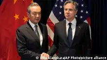 U.S. Secretary of State Antony Blinken, right, shakes hands with Chinese Communist Party's foreign policy chief Wang Yi during their bilateral meeting on the sidelines of the Association of Southeast Asian Nations (ASEAN) Foreign Ministers' Meeting in Jakarta, Indonesia, Thursday, July 13, 2023. (AP Photo/Dita Alangkara, Pool)