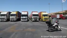 10.07.2023 A convoy of trucks carrying humanitarian aid is seen parked after crossing the Syrian Bab al-Hawa border crossing with Turkey, on July 10, 2023. Negotiations continued at the United Nations on July 10, 2023, as officials scrambled to reach a last-minute agreement on extending vital cross-border aid to millions of people in Syria, according to diplomatic sources. A vote on the deal's extension, originally scheduled for 10:00 am (1400 GMT) Monday, has been postponed to allow for further consultation among Security Council members, the British UN mission, which heads the council this month, said on Twitter. (Photo by OMAR HAJ KADOUR / AFP)