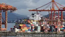 October 26, 2018 - Vancouver, British Columbia, Canada - Gantry cranes and shipping containers at Centerm container facility on Vancouver's downtown waterfront. The Port of Vancouver facility is operated by DP World Vancouver