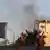 الدخان يتصاعد من مبنى السفارة السويدية في بغداد
