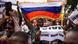 A group of people in the Place de l'Independance in Bamako holding Russian flags and banners supporting cooperation between Mali and Russia A group of people in the Place de l'Independance in Bamako holding Russian flags and banners supporting cooperation between Mali and Russia