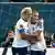 USA captain Lindsey Horan (left) and Sophia Smith embrace