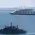 A Russian Navy amphibious landing ship moves near the Kerch Bridge, Crimea on July 17, 2023