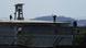 Police stand guard on the roof of a prison in Guayaquil, Ecuador, after deadly clashes broke out on Nov 4, 202. Police stand guard on the roof of a prison in Guayaquil, Ecuador, after deadly clashes broke out on Nov 4, 202.