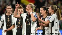 Germany's forward #11 Alexandra Popp (C) celebrates with teammates after scoring her team's second goal during the Australia and New Zealand 2023 Women's World Cup Group H football match between Germany and Morocco at Melbourne Rectangular Stadium, also known as AAMI Park, in Melbourne on July 24, 2023. (Photo by WILLIAM WEST / AFP) (Photo by WILLIAM WEST/AFP via Getty Images)