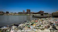 BAGHDAD, IRAQ - JULY 04: A view of the garbage by Tigris River as it is severely polluted due to chemicals, waste, and discharge of sewage water in Baghdad, Iraq on July 04, 2023. Toxic waste discharged from Baghdad Medical City and garbage disposal from nearby towns pollute the river and the air, increasing the risk of sickness including cancer. (Photo by Murtadha Al-Sudani/Anadolu Agency via Getty Images)