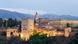 The Alhambra castle in Granada with the Sierra Nevada mountains in the background The Alhambra castle in Granada with the Sierra Nevada mountains in the background