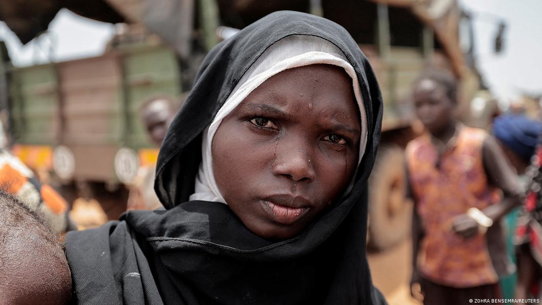 Amani Abdullah, 20, a Sudanese woman who fled the conflict in Geneina in Sudan's Darfur region, mourns her husband, who according to her was killed by Rapid Support Forces (RSF) at their house.