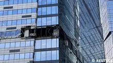 A view shows the damaged facade of an office building in the Moscow City following a reported Ukrainian drone attack in Moscow, Russia, July 30, 2023. REUTERS/Staff