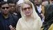 Khaleda Zia leaves a court appearance in Dhaka surrounded by bodyguards and supporters Khaleda Zia leaves a court appearance in Dhaka surrounded by bodyguards and supporters