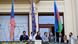 The Romani flag, right, being hoisted at the New Town Hall on the occasion of International Day of Remembrance of the Roma Victims of the Holocaust in Prague The Romani flag, right, being hoisted at the New Town Hall on the occasion of International Day of Remembrance of the Roma Victims of the Holocaust in Prague