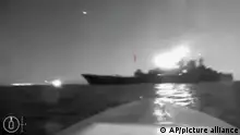 In this grab taken from video released on Friday, Aug. 4, 2023, a drone manoeuvers as it approaches the vessel claimed to be a Russian large landing ship, the Olenegorsky Gonyak, close to the Black Sea port of Novorossiysk. Russia had accused Ukraine of attacking its Black Sea navy base in the port of Novorossiysk with sea drones. (via AP)