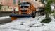 A snowplow clears a layer of thick ice from a street in Reutlingen, Germany on August 4, 2023 A snowplow clears a layer of thick ice from a street in Reutlingen, Germany on August 4, 2023