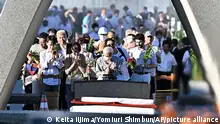 People visit the Peace Memorial Park to offer prayers for the Atomic Bomb Victims in Hiroshima City, Hiroshima Prefecture on Aug. 6 2023, on the 78th anniversary of the Hiroshima Atomic Bombing. ( The Yomiuri Shimbun via AP Images )