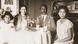 Mandenga and Emilie Diek sit with their daughters Erika and Doris Mandenga and Emilie Diek sit with their daughters Erika and Doris