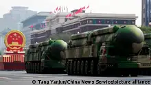 ©/MAXPPP - BEIJING, CHINA - OCTOBER 01: Military vehicles carrying nuclear-capable DF-41 intercontinental ballistic missiles march during a military parade marking the 70th anniversary of the founding of the People's Republic of China (PRC) at Tiananmen Square on October 1, 2019 in Beijing, China. (Photo by Tang Yanjun/China News Service/VCG)