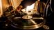 Dj in studio puts needle on record Dj in studio puts needle on record