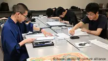 Students learn how to draw Buddhist paintings at Esoteric Buddhism Program at Koyasan University in Koya Town, Wakayama Prefecture on July 3, 2023. The university was founded in 1886 and conducts education and research based on the spirit of esoteric Buddhism. ( The Yomiuri Shimbun via AP Images )