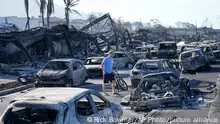 11.08.2023
A man walks through wildfire wreckage Friday, Aug. 11, 2023, in Lahaina, Hawaii. Hawaii emergency management records show no indication that warning sirens sounded before people ran for their lives from wildfires on Maui that wiped out a historic town. (AP Photo/Rick Bowmer)