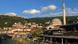 The sun shines on the old quarter of Prizren, the Sinan Pasha Mosque and the river, Prizren, Kosovo