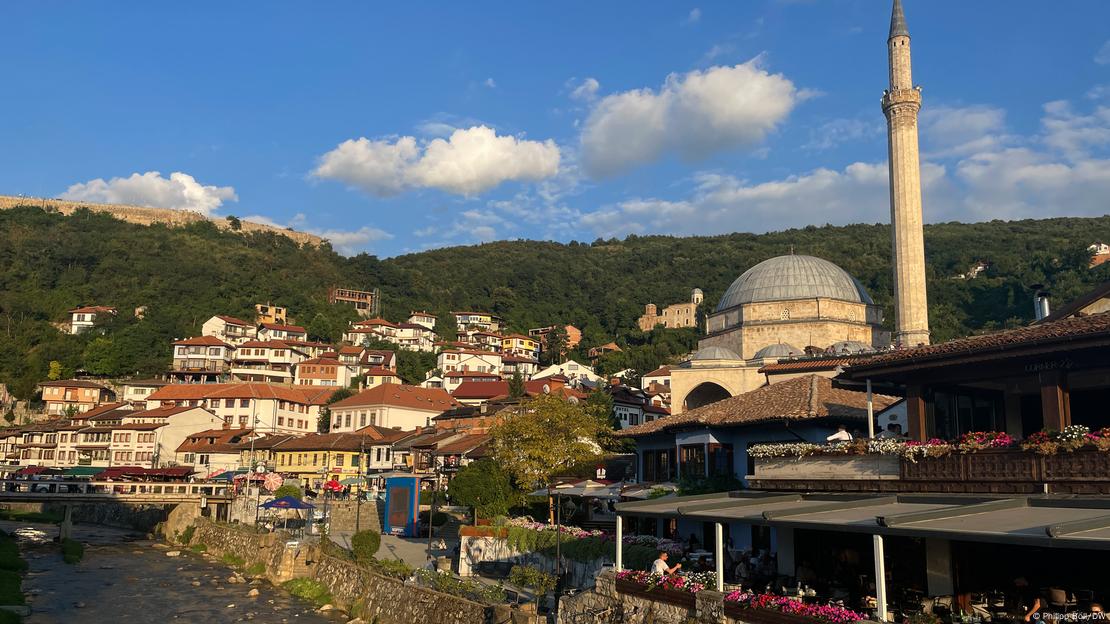 The sun shines on the old quarter of Prizren, the Sinan Pasha Mosque and the river, Prizren, Kosovo