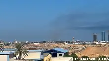 15.08.2023+++ Smoke rises amid clashes between armed factions, in Tripoli, Libya August 15, 2023. REUTERS/Hani Amara 