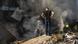 Firefighters work to put out fire in Kramatorsk as man looks over rubble Firefighters work to put out fire in Kramatorsk as man looks over rubble