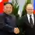 俄罗斯总统普京（右）和朝鲜领导人金正恩于2019年4月25日在俄罗斯符拉迪沃斯托克举行会议期间握手。